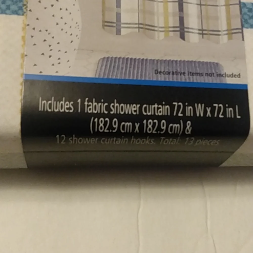 Mainstays 13 piece lightweight multi-colored printed fabric shower curtain.